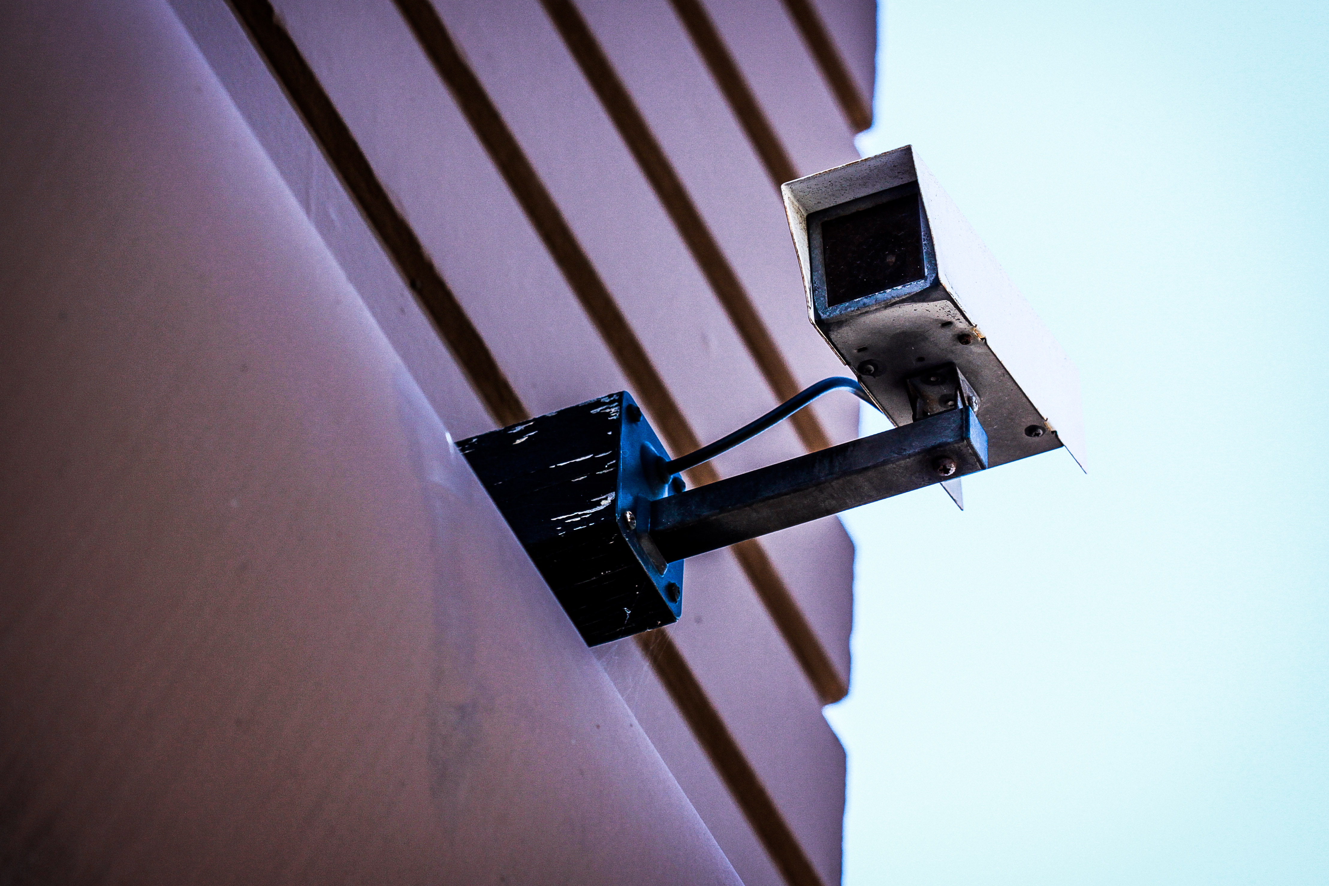 A security camera mounted on a building